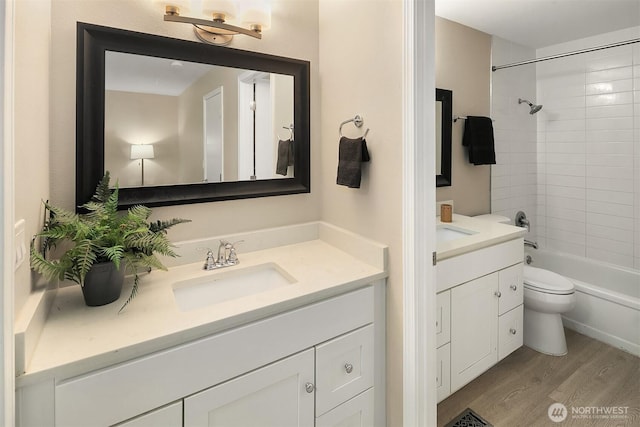 12024 101st Ave NE Unit E3, Kirkland, WA 98034 - full bath featuring vanity, wood finished floors, and bathtub / shower combination