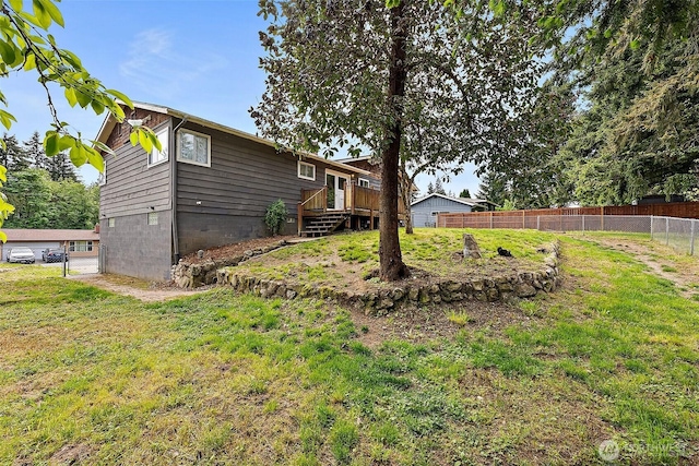 view of yard featuring a deck