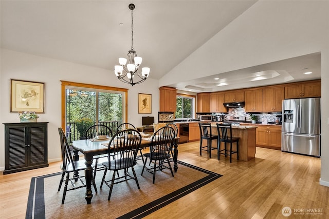 30830 NE 165th St, Duvall, WA 98019 - dining room with light wood-style floors, a chandelier, plenty of natural light, lofted ceiling, and recessed lighting