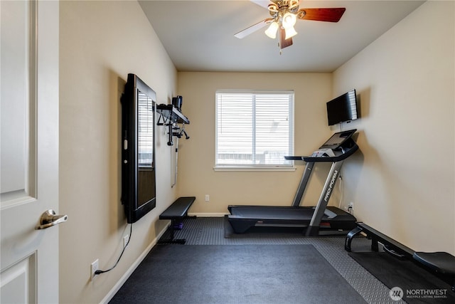workout area with ceiling fan, carpet floors, and baseboards