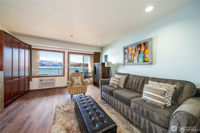 322 W W Woodin Ave Unit 523, Chelan, WA 98816 - living room featuring a wall unit AC, wood finished floors, and recessed lighting