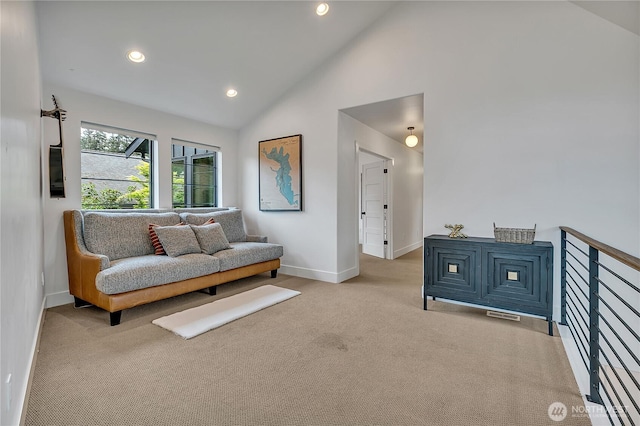 29108 218th Pl SE, Black Diamond, WA 98010 - carpeted living area featuring baseboards, recessed lighting, and high vaulted ceiling
