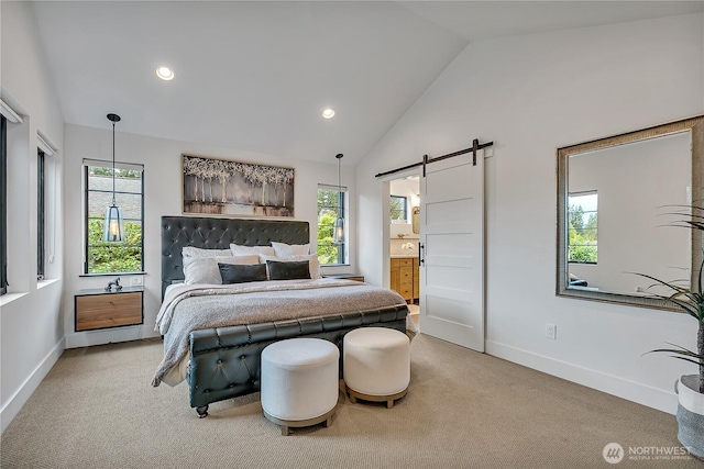 29108 218th Pl SE, Black Diamond, WA 98010 - bedroom featuring a barn door, light colored carpet, multiple windows, baseboards, and high vaulted ceiling