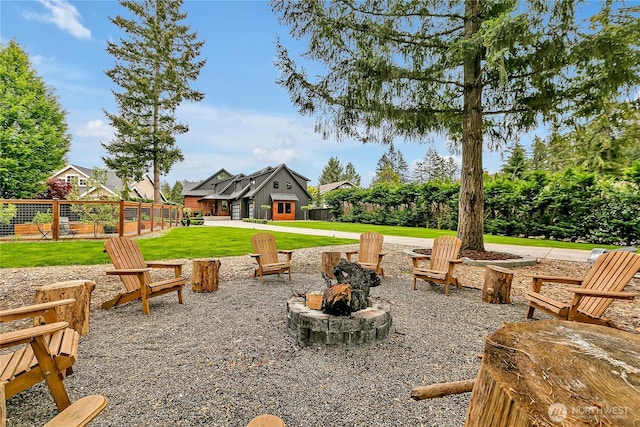 29108 218th Pl SE, Black Diamond, WA 98010 - view of grassy yard featuring an outdoor fire pit