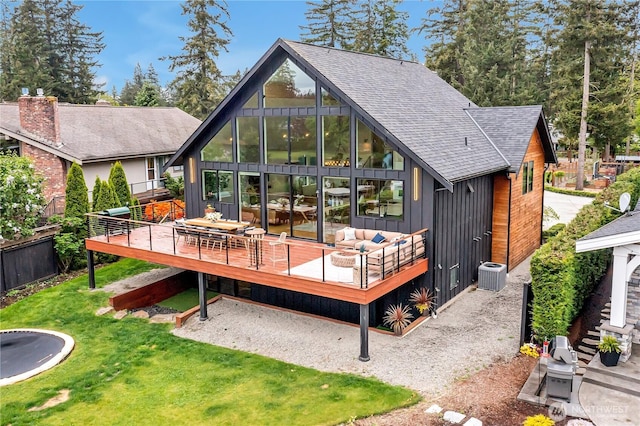 29108 218th Pl SE, Black Diamond, WA 98010 - rear view of property featuring central AC, a wooden deck, a shingled roof, and a yard