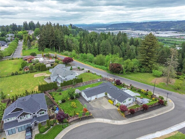 4112 Caldwell Rd E, Edgewood, WA 98372 - aerial perspective of suburban area with a mountainous background