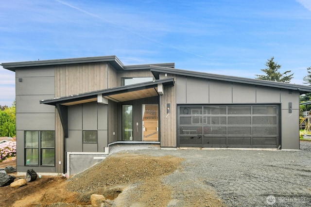 18809 94th Ave W, Edmonds, WA 98020 - contemporary home featuring an attached garage and gravel driveway