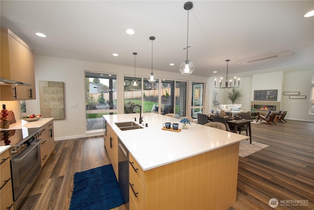 18809 94th Ave W, Edmonds, WA 98020 - kitchen featuring a sink, stainless steel appliances, dark wood-type flooring, open floor plan, and light countertops