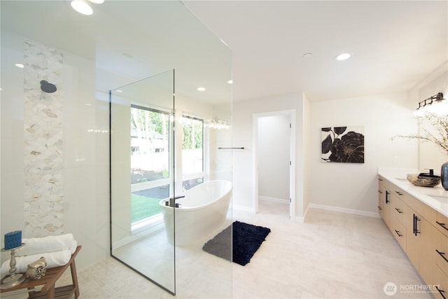 18809 94th Ave W, Edmonds, WA 98020 - full bathroom with a freestanding bath, vanity, a walk in shower, recessed lighting, and baseboards