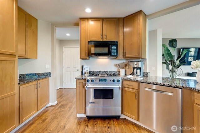 12045 Lakeside Pl NE, Seattle, WA 98125 - kitchen with stainless steel appliances, dark stone counters, wood finished floors, and recessed lighting
