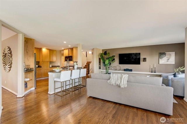 12045 Lakeside Pl NE, Seattle, WA 98125 - living area featuring stairway, wood finished floors, recessed lighting, and baseboards