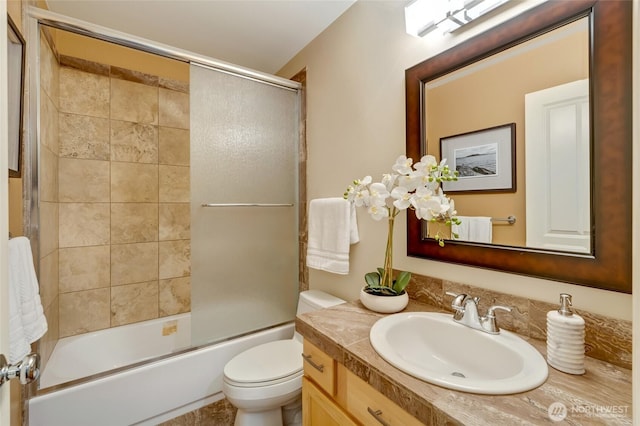 12045 Lakeside Pl NE, Seattle, WA 98125 - full bathroom featuring vanity, toilet, and bath / shower combo with glass door