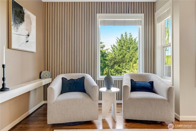 12045 Lakeside Pl NE, Seattle, WA 98125 - sitting room featuring baseboards, wood finished floors, and radiator heating unit