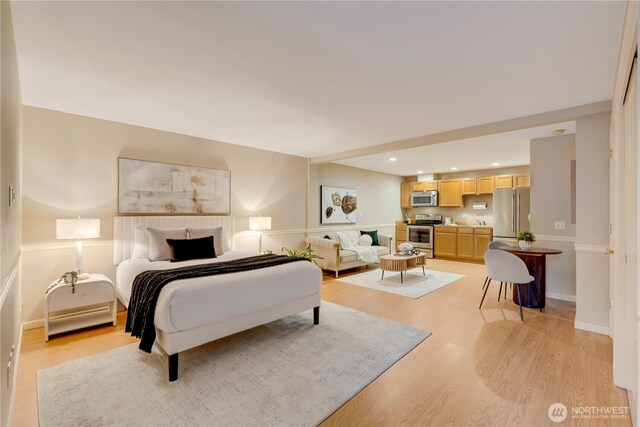 12045 Lakeside Pl NE, Seattle, WA 98125 - bedroom with freestanding refrigerator, light wood finished floors, and recessed lighting
