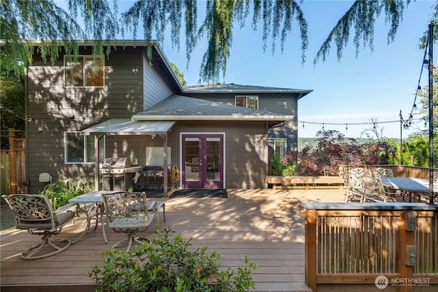 12045 Lakeside Pl NE, Seattle, WA 98125 - back of property with french doors, outdoor dining space, and a deck