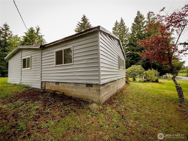 15712 123rd Ave SE, Yelm, WA 98597 - view of property exterior with crawl space and a lawn