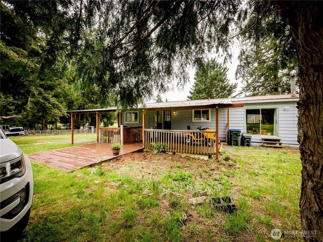 15712 123rd Ave SE, Yelm, WA 98597 - view of front of home featuring a deck and metal roof