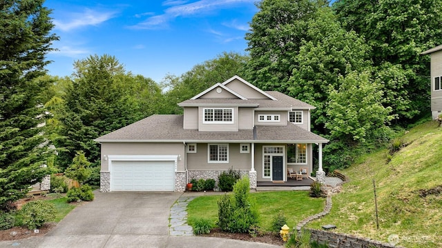 4964 Lewis Ave, Bellingham, WA 98229 - craftsman house featuring asphalt driveway, a garage, a porch, a front yard, and stone siding