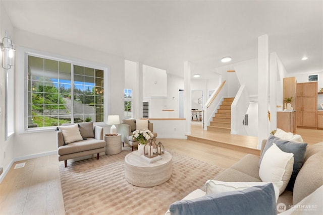 4964 Lewis Ave, Bellingham, WA 98229 - living area featuring wood finished floors, stairway, baseboards, and recessed lighting