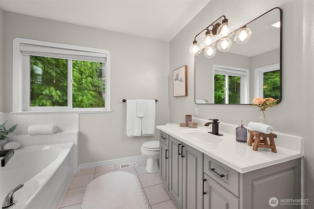 4964 Lewis Ave, Bellingham, WA 98229 - bathroom featuring healthy amount of natural light, a bath, vanity, and tile patterned floors