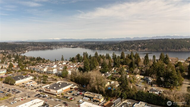 14300 32nd Ave NE Unit 402, Seattle, WA 98125 - view of property location with a nearby body of water and a heavily wooded area