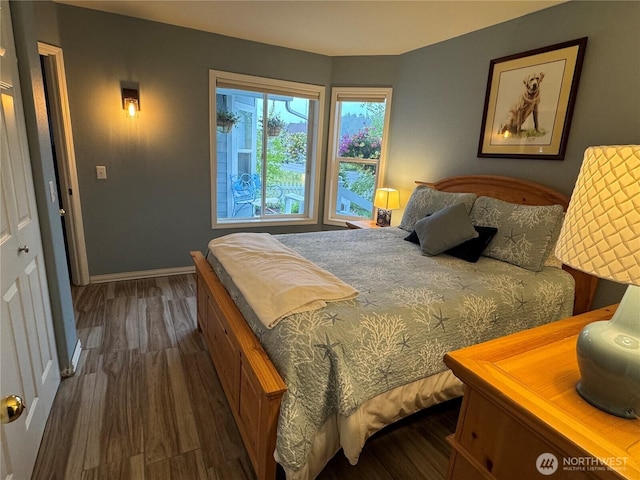 2615 Sea Crest Ave N, Long Beach, WA 98631 - bedroom with dark wood-style floors and baseboards