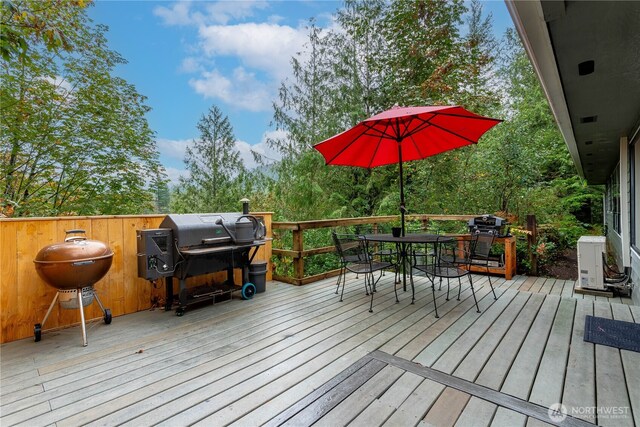 42520 State Route 2, Gold Bar, WA 98251 - wooden terrace with outdoor dining area and area for grilling