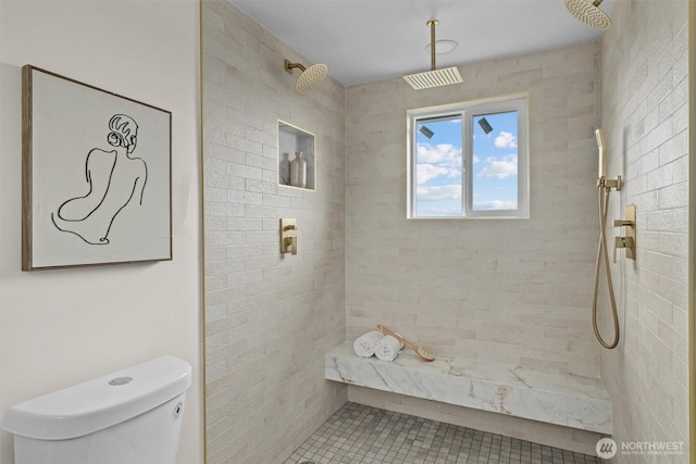 2711 10th Ave W, Seattle, WA 98119 - full bathroom featuring a tile shower, toilet, and tile patterned floors