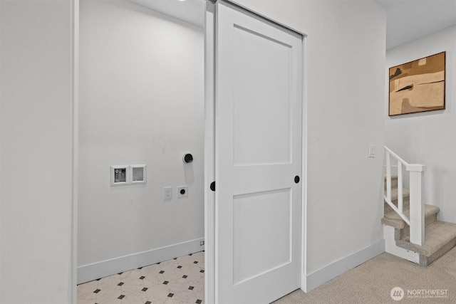 2711 10th Ave W, Seattle, WA 98119 - laundry area featuring electric dryer hookup, baseboards, washer hookup, and light floors