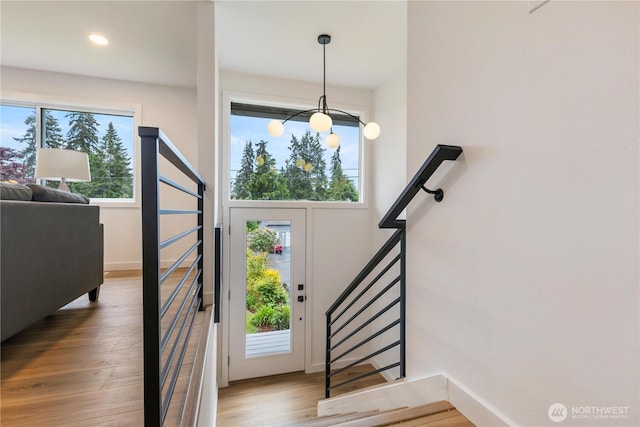 1831 201st Pl SW, Lynnwood, WA 98036 - foyer entrance with wood finished floors, recessed lighting, and stairs