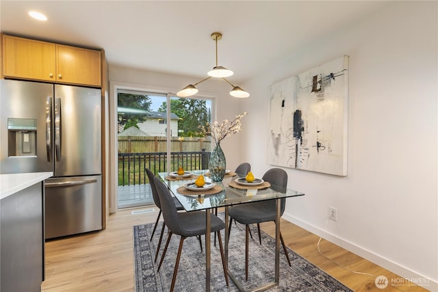 1831 201st Pl SW, Lynnwood, WA 98036 - dining area featuring light wood-style flooring