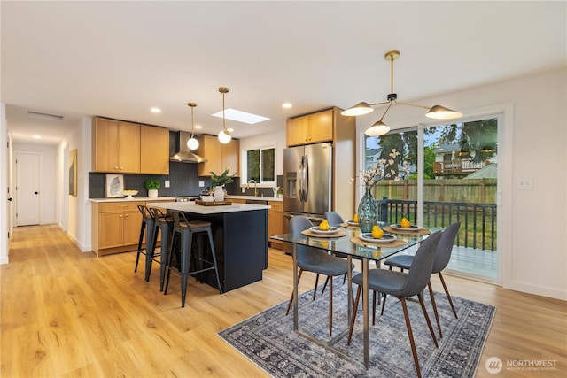 1831 201st Pl SW, Lynnwood, WA 98036 - dining space featuring light wood finished floors and recessed lighting
