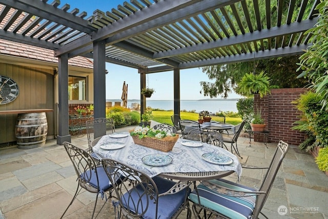 24635 8th Ave S, Des Moines, WA 98198 - view of patio / terrace with outdoor dining space, a water view, and a pergola