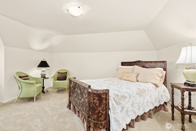 24635 8th Ave S, Des Moines, WA 98198 - carpeted bedroom featuring vaulted ceiling and baseboards