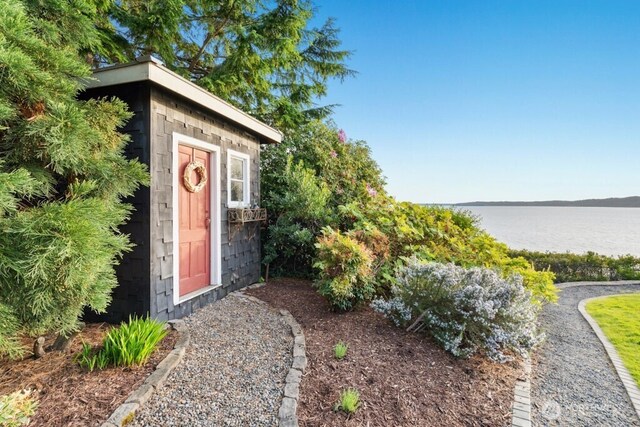 24635 8th Ave S, Des Moines, WA 98198 - view of outdoor structure with a water view
