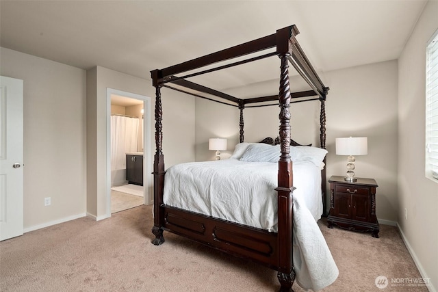 4914 Bering St, Gig Harbor, WA 98332 - bedroom featuring carpet floors, connected bathroom, and baseboards