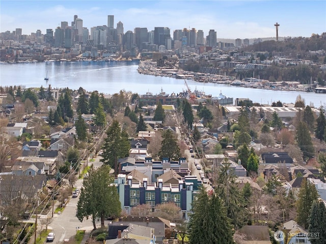 1521 N 39th St, Seattle, WA 98103 - aerial view of property and surrounding area with a nearby body of water and skyline
