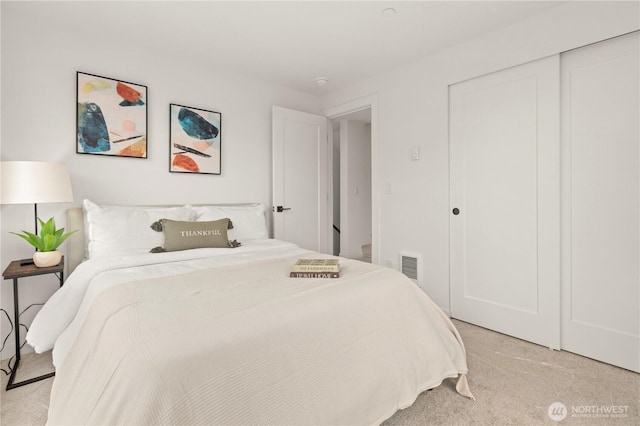 1521 N 39th St, Seattle, WA 98103 - bedroom featuring light colored carpet and a closet