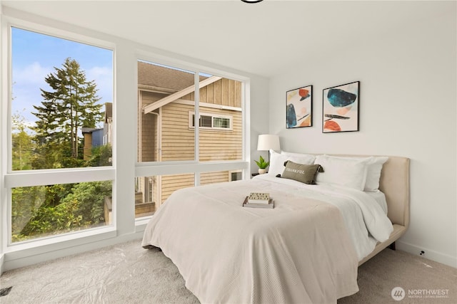 1521 N 39th St, Seattle, WA 98103 - carpeted bedroom featuring baseboards