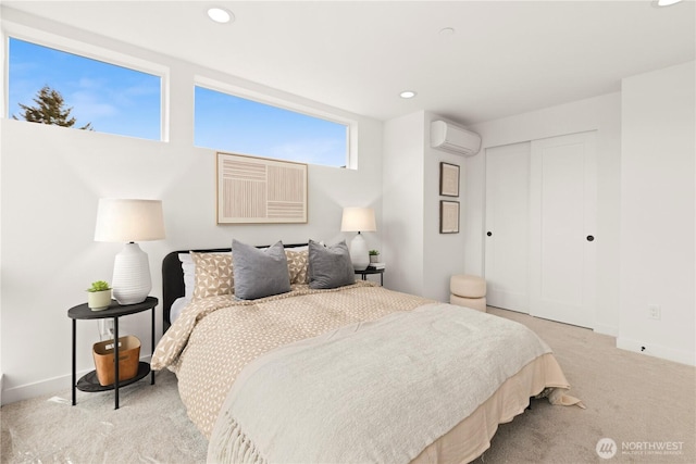 1521 N 39th St, Seattle, WA 98103 - carpeted bedroom featuring a wall mounted AC, recessed lighting, a closet, and baseboards