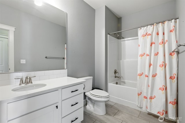 full bathroom with vanity, toilet, tile patterned flooring, shower / bath combination with curtain, and decorative backsplash