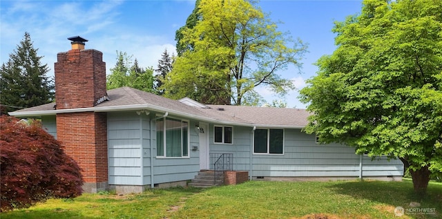 2116 Union Ave SE, Olympia, WA 98501 - back of property with a chimney and a yard