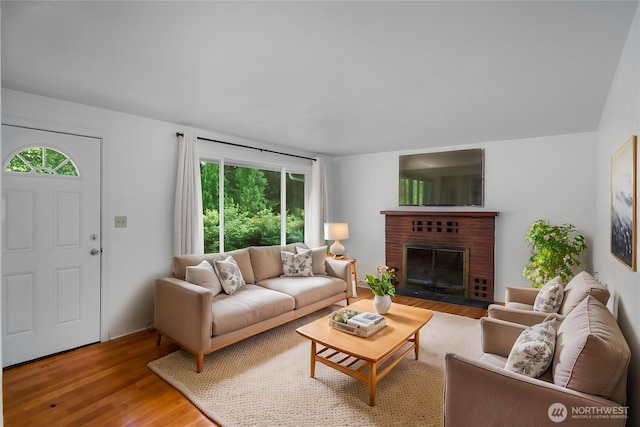 2116 Union Ave SE, Olympia, WA 98501 - living room with wood finished floors and a brick fireplace