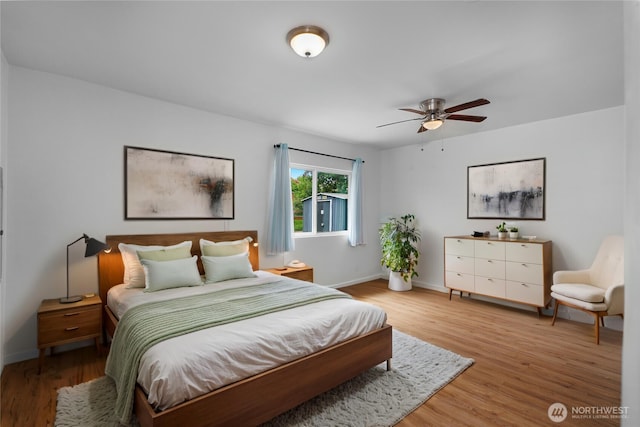 2116 Union Ave SE, Olympia, WA 98501 - bedroom featuring baseboards and light wood finished floors