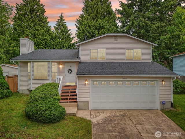 12515 NE 107th Pl, Kirkland, WA 98033 - tri-level home with an attached garage, driveway, a shingled roof, and a chimney