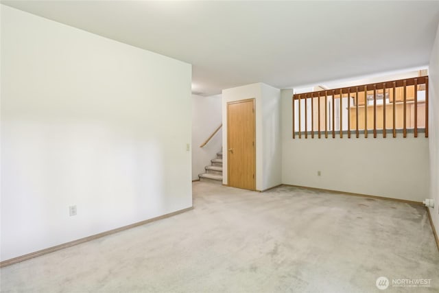 12515 NE 107th Pl, Kirkland, WA 98033 - unfurnished room featuring carpet floors, stairs, and baseboards