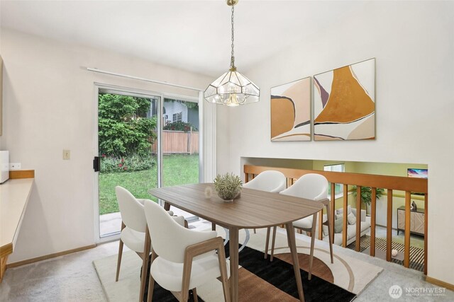 12515 NE 107th Pl, Kirkland, WA 98033 - dining area with a chandelier, carpet, and baseboards