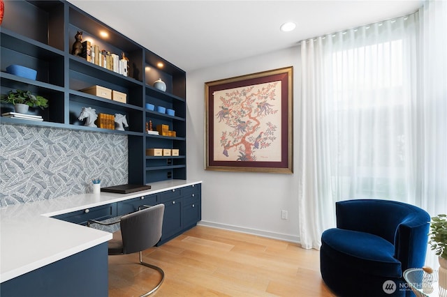 7734 Seward Park Ave S, Seattle, WA 98118 - office area featuring built in desk, light wood-type flooring, baseboards, and recessed lighting