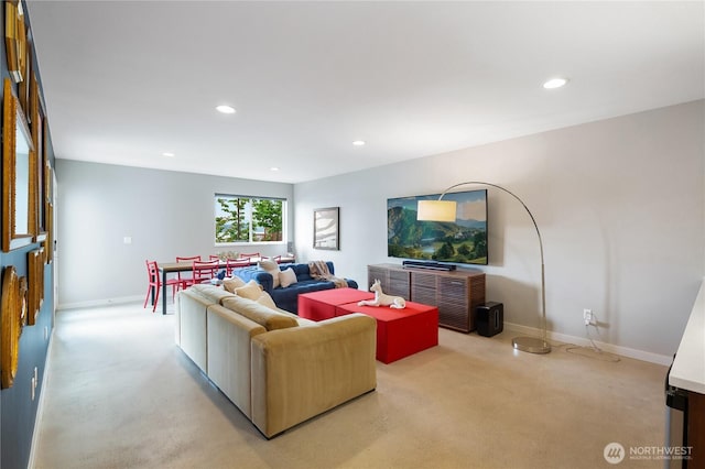 7734 Seward Park Ave S, Seattle, WA 98118 - carpeted living room featuring recessed lighting and baseboards