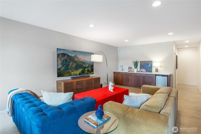 7734 Seward Park Ave S, Seattle, WA 98118 - living area featuring light carpet, recessed lighting, and baseboards